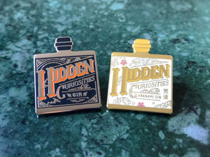 Hidden Curiosities Gin Badge